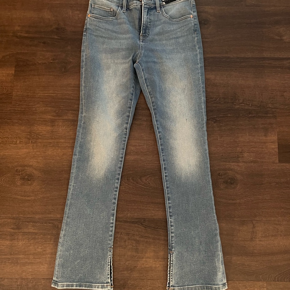 Two pair Express skyscraper jeans